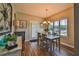Bright dining area with hardwood floors and a view of the backyard at 501 Grace Ct, Temple, GA 30179