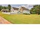 Charming single-Gathering home with manicured lawn and white picket fence at 501 Grace Ct, Temple, GA 30179