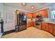 Functional kitchen featuring wood cabinets and modern appliances at 501 Grace Ct, Temple, GA 30179