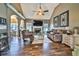Cozy living room with vaulted ceilings, fireplace, and hardwood floors at 501 Grace Ct, Temple, GA 30179