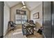 Home office with vaulted ceilings, two chairs and a work desk at 501 Grace Ct, Temple, GA 30179