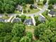 A high angle shot reveals a home with a spacious backyard and neighborhood setting at 1920 Lee Patrick Dr, Dacula, GA 30019