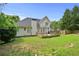 An expansive backyard offering a wooden deck with a gazebo for outdoor entertaining at 1920 Lee Patrick Dr, Dacula, GA 30019