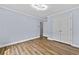 Comfortable bedroom with wood floors, natural light, neutral walls, and double door closet at 1920 Lee Patrick Dr, Dacula, GA 30019