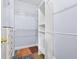 Walk-in closet with white shelving units and rods at 1920 Lee Patrick Dr, Dacula, GA 30019