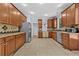 Spacious kitchen with wood cabinets, stainless steel appliances, and tile flooring at 1920 Lee Patrick Dr, Dacula, GA 30019
