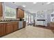 Open concept kitchen with stainless steel appliances and an adjacent living space at 1920 Lee Patrick Dr, Dacula, GA 30019