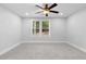Bedroom featuring neutral paint, carpet and natural light at 2209 Browns Mill Se Rd, Atlanta, GA 30315
