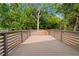 Exterior deck overlooks the backyard and surrounding trees at 2209 Browns Mill Se Rd, Atlanta, GA 30315
