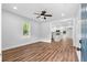 Bright living room with hardwood floors, recessed lighting, and an open view to the kitchen at 2209 Browns Mill Se Rd, Atlanta, GA 30315