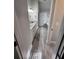 Bathroom with dual sinks, granite countertop, and tile flooring at 2439 Muirfield Pl, Atlanta, GA 30337