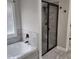 Relaxing bathroom showcasing a tub with tile surround at 2439 Muirfield Pl, Atlanta, GA 30337