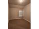 Bedroom with one window at 2439 Muirfield Pl, Atlanta, GA 30337