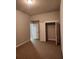 Bedroom with connecting door and closet at 2439 Muirfield Pl, Atlanta, GA 30337
