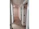 Hallway showing view to multiple rooms at 2439 Muirfield Pl, Atlanta, GA 30337