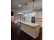 Kitchen featuring granite island and stainless steel appliances at 2439 Muirfield Pl, Atlanta, GA 30337
