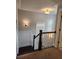 Staircase with carpeted steps and white wood trim at 2439 Muirfield Pl, Atlanta, GA 30337