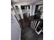 View from staircase highlighting dark wood floors and white trim at 2439 Muirfield Pl, Atlanta, GA 30337