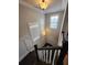 Staircase landing with natural light at 2439 Muirfield Pl, Atlanta, GA 30337