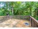 Exterior back deck with wood railings overlooking wooded area at 310 Rippling Brook Trce, Palmetto, GA 30268