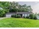 Charming one-story home with a two-car garage and well-maintained lawn at 310 Rippling Brook Trce, Palmetto, GA 30268