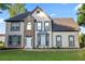 Charming two-story home with stone facade and manicured lawn in a suburban neighborhood at 4186 Stillwater Pt, Ellenwood, GA 30294