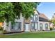 Beautiful two-story home featuring stone accents and professional landscaping, creating an inviting curb appeal at 4186 Stillwater Pt, Ellenwood, GA 30294