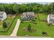 Gorgeous suburban home with pristine landscaping and a sprawling lawn on a sunny day at 107 Equest Dr, Canton, GA 30115