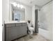 Bathroom featuring a single sink vanity and a shower and tub at 107 Equest Dr, Canton, GA 30115