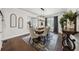 Charming dining room featuring hardwood floors and abundant natural light at 107 Equest Dr, Canton, GA 30115