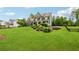 Attractive home with a manicured lawn, neatly trimmed shrubs, and an inviting front facade at 107 Equest Dr, Canton, GA 30115