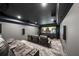 Enjoy movies in this home theater with plush seating and an immersive surround sound system at 107 Equest Dr, Canton, GA 30115
