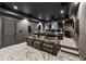 Basement home theater room with comfortable seating and state of the art technology at 107 Equest Dr, Canton, GA 30115