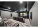 Enjoy movies in this home theater with tiered seating, large screen, and surround sound system at 107 Equest Dr, Canton, GA 30115