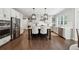 Bright kitchen with stainless appliances, large island and breakfast bar seating at 107 Equest Dr, Canton, GA 30115