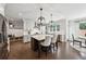 Spacious kitchen with large island, stainless appliances, and modern lighting fixtures at 107 Equest Dr, Canton, GA 30115