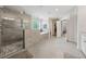 Open concept main bathroom with a large shower, garden tub, and dual vanities at 107 Equest Dr, Canton, GA 30115