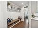 Mudroom with built-in storage and a pantry, providing ample space for organization at 107 Equest Dr, Canton, GA 30115