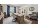 Cozy office featuring a large desk, hardwood floors, and natural light at 107 Equest Dr, Canton, GA 30115
