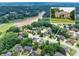 Aerial photograph featuring the home's location near a river, surrounded by lush greenery at 1564 Stepstone Way, Lawrenceville, GA 30043