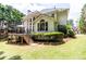 A beautiful two story home with a deck and lush green grass at 1564 Stepstone Way, Lawrenceville, GA 30043