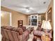 Cozy finished basement with large TV, plush seating, and bright lighting at 1564 Stepstone Way, Lawrenceville, GA 30043