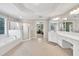 This bathroom features a large tub, walk-in shower, and double vanity at 1564 Stepstone Way, Lawrenceville, GA 30043