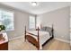 Cozy bedroom with natural light and neutral tones, creating a relaxing atmosphere at 1564 Stepstone Way, Lawrenceville, GA 30043