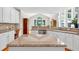 Spacious kitchen with granite countertops, stainless steel appliances, and lots of natural light at 1564 Stepstone Way, Lawrenceville, GA 30043