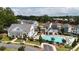 Aerial view of community pool area and clubhouse with inviting amenities at 258 Dawson Dr, Woodstock, GA 30188
