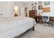 Comfortable bedroom with neutral tones, featuring an inviting bed and stylish decor at 258 Dawson Dr, Woodstock, GA 30188