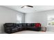 Comfortable living room with sectional and natural light, perfect for relaxation at 258 Dawson Dr, Woodstock, GA 30188