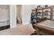 Home office featuring a desk and shelves at 258 Dawson Dr, Woodstock, GA 30188