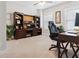 Well-lit home office space with built-in shelving, perfect for remote work or study at 258 Dawson Dr, Woodstock, GA 30188